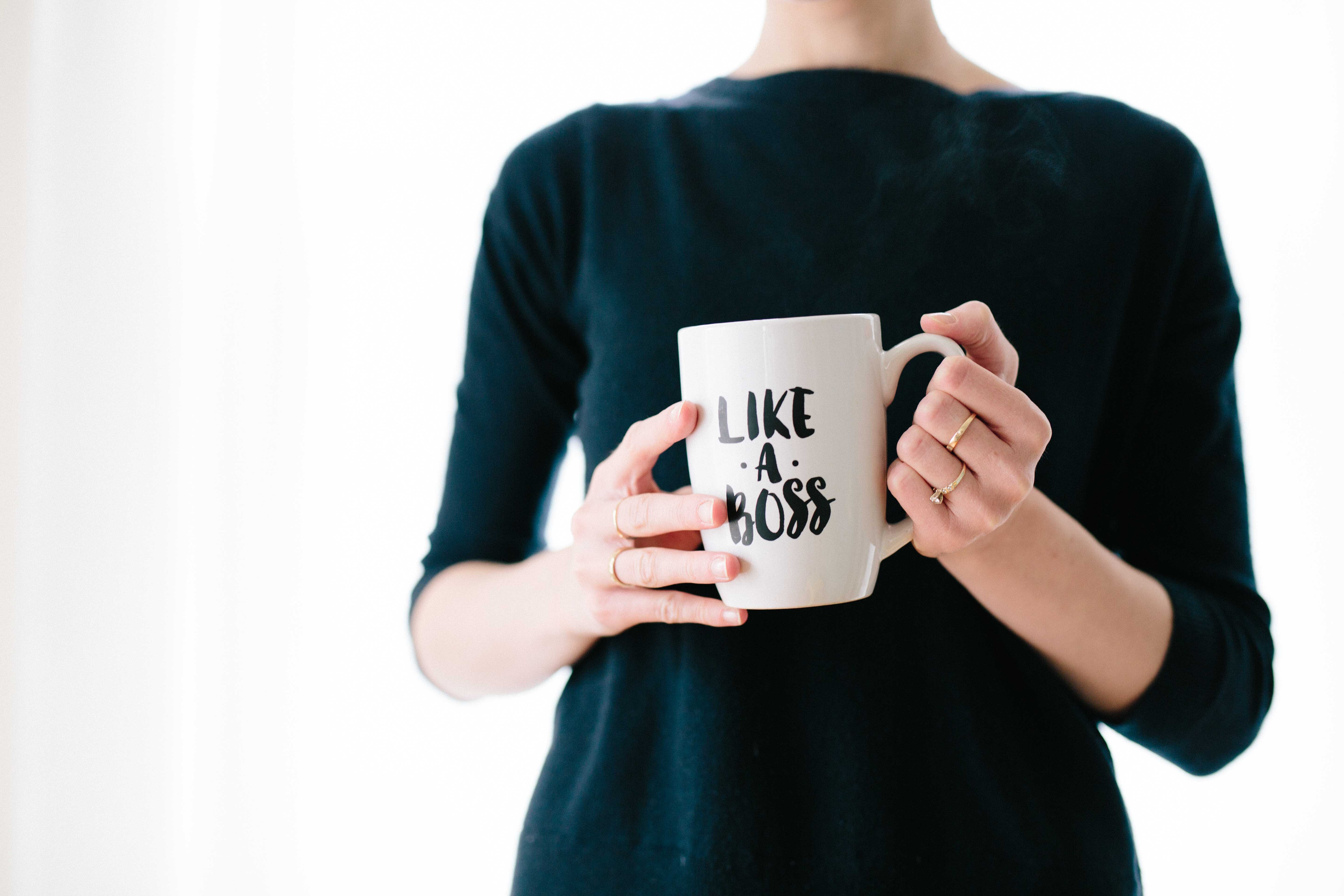 Like a boss cup held by woman